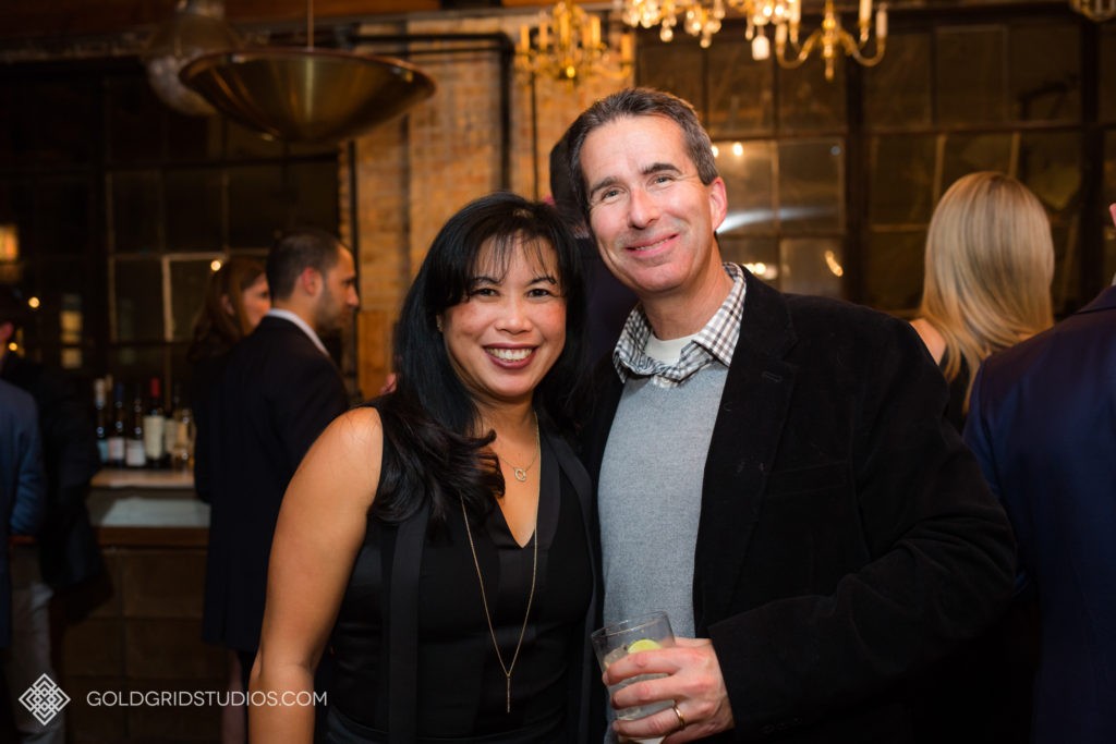 Couple attends company holiday party.