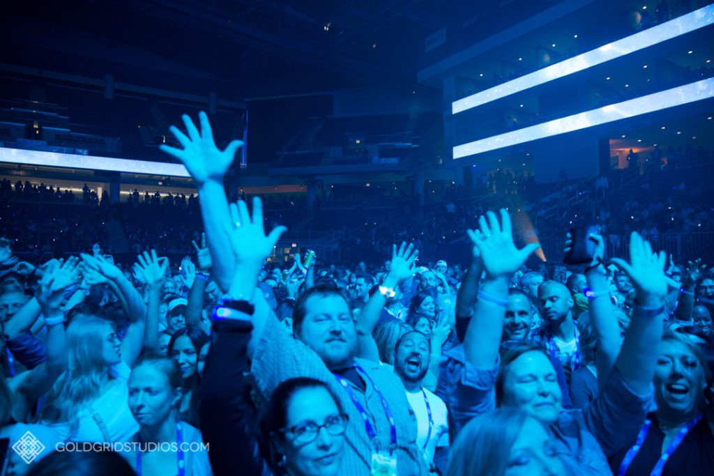 Conference attendees enjoy a private concert at Wintrust Arena in Chicago